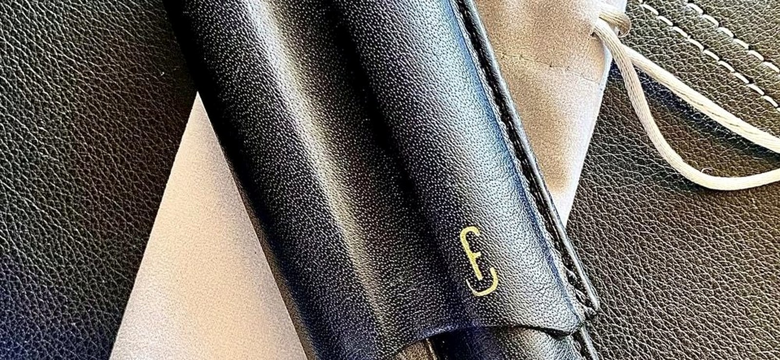 A racing-green leather cigar holder, a gift-worthy one-of-one