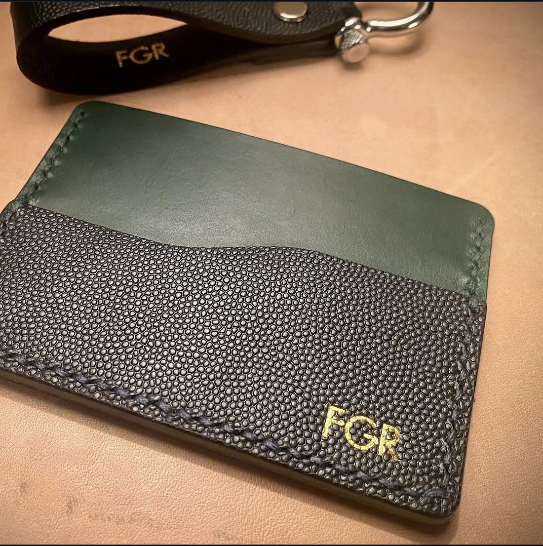 Kuko card wallet in forest green and blue caviar