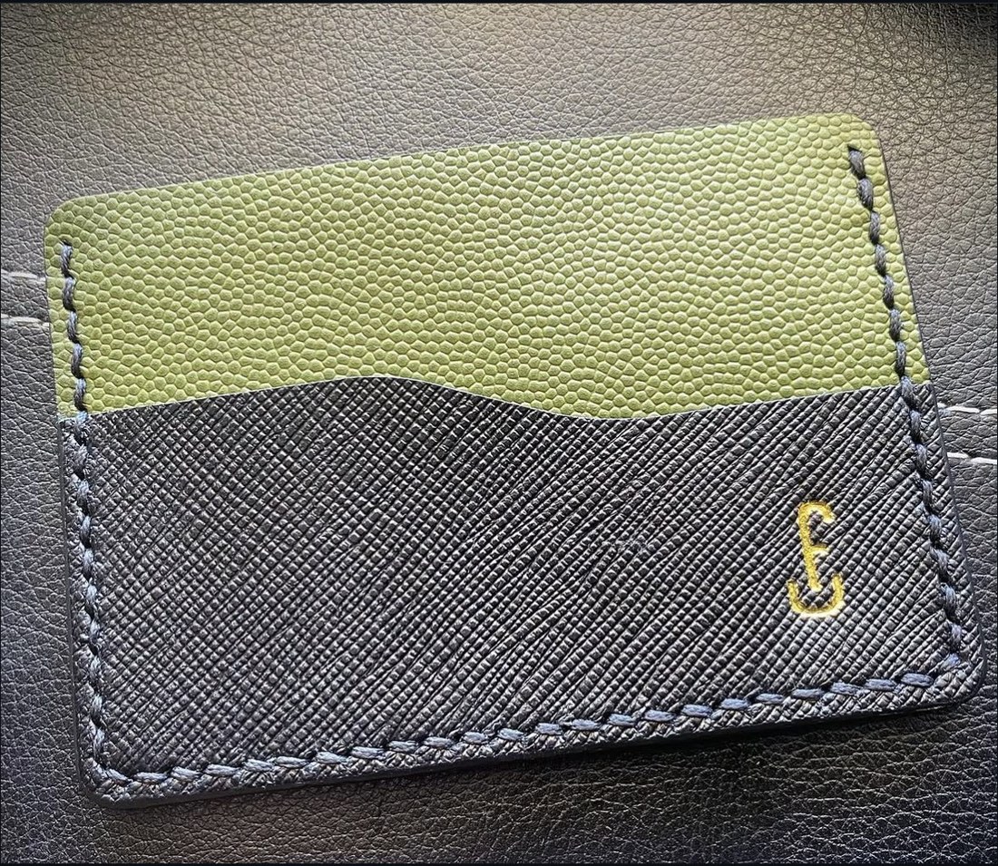 Kuko card wallet in black saffiano and olive caviar